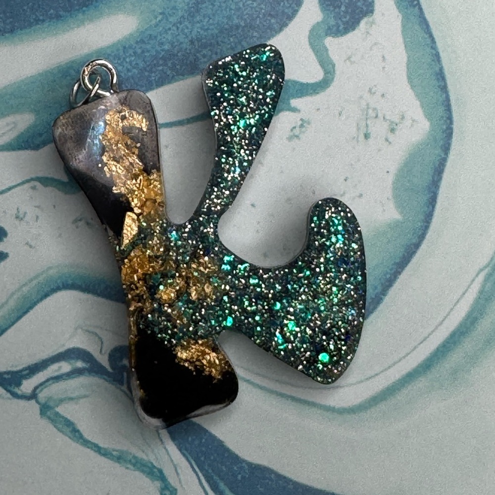 Letter K Resin with Gold Foil
And Glittering Blue, Black Handcrafted newly made.